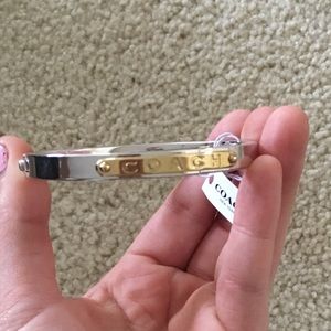 Silver coach hinged bracket. New with tags.